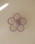 DAISY RATTLE TEETHER SOFT LILAC