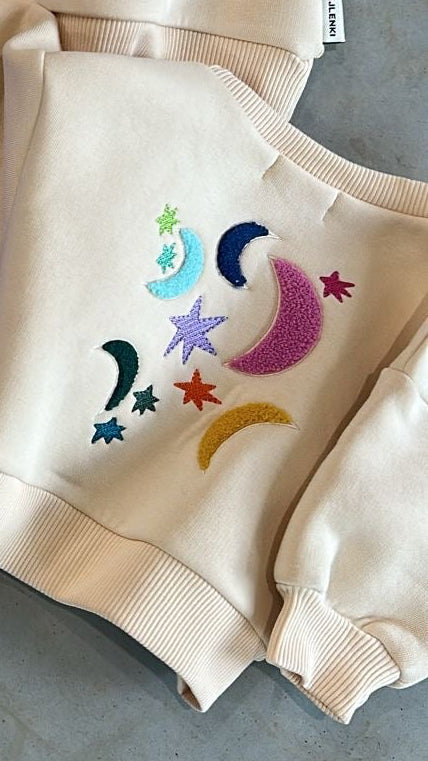 COMMUNITY SWEATER DREAM BIG